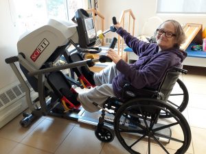 Debbie on the SciFit StepOne Recumbent Stepper